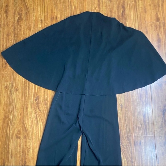 NWT New Nasty Gal Women's Black Deep V Neck Cape Straight Leg Jumpsuit Size 4 - Picture 7 of 16